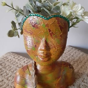 Hand painted doll head planter